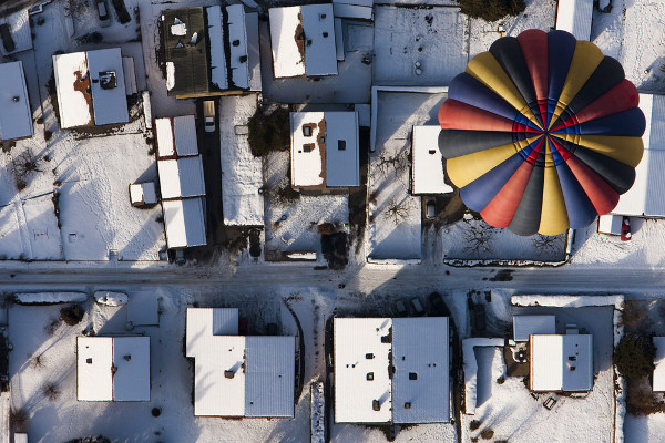 Reuters Best Photos of 2010 - VALENTIN FLAURAUD captures hot air balloon week in Switzerland