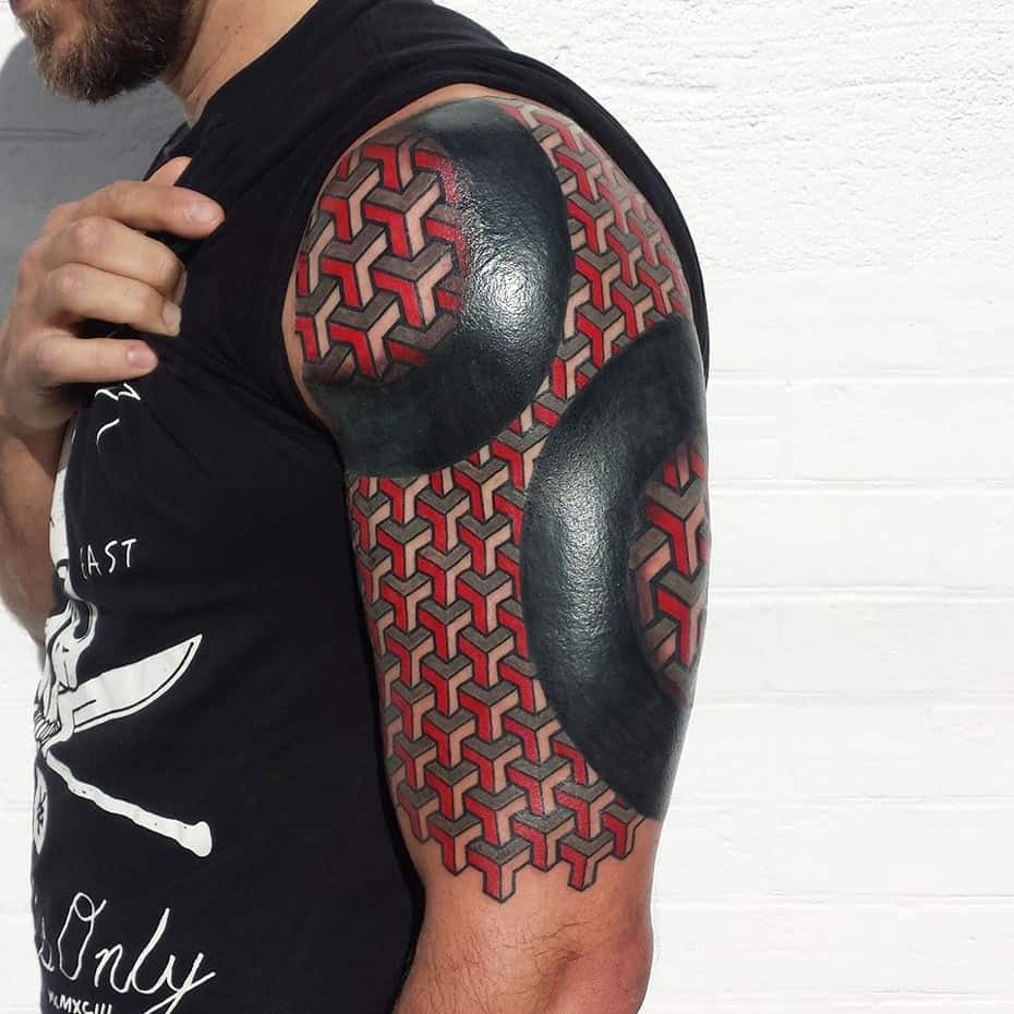 Second Skin patterned sleeve tattoo
