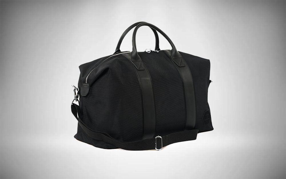 Mens Bags Duffel bags and weekend bags Eastpak Synthetic Kraig Powr Holdall in Black for Men 