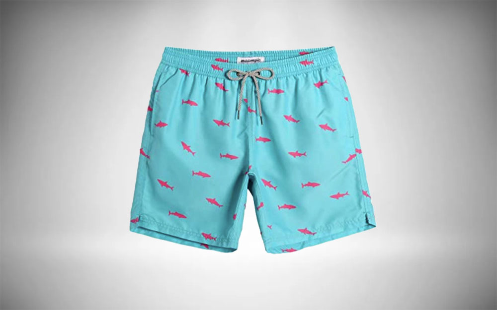 Maamgic - 7" Swim Trunks in teal and pink shark pattern