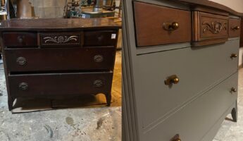 Before and after of a 1940s bow-front dresser, with the beat-up original on the left in a basement workshop next to copper pipes and a flattened cardboard box, and the finished version on the right in warm Minwax Antique Walnut on top, a carved shell-and-leaf center drawer, an olive-sage painted body, and brass pulls catching the light.