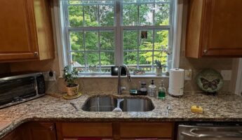They painted oak cabinets Westhighland White and the island Sage Green Light: same granite, new kitchen