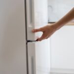Wedge A Sheet Of Paper In The Fridge Door And Pull