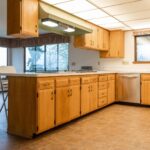 They removed one dated feature from this maple kitchen: now the whole room feels twice as big