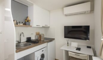 No separate bedroom, barely any floor space: how a New York apartment hides its biggest furniture